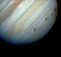 Jupiters black eyes, after it was assaulted by Comet Shoemaker-Levy-9